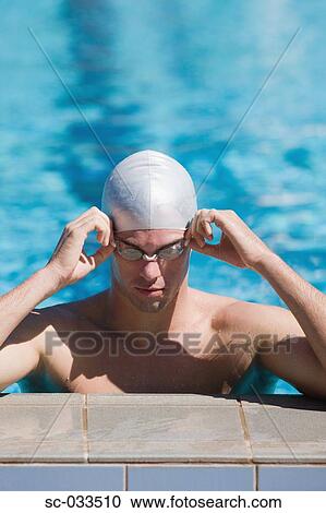 Stock Image - Australian athlete wearing protective gear. Fotosearch