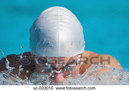 Young swimmer doing breaststroke View Large Photo Image Stock Image - Young swimmer doing breaststroke. Fotosearch