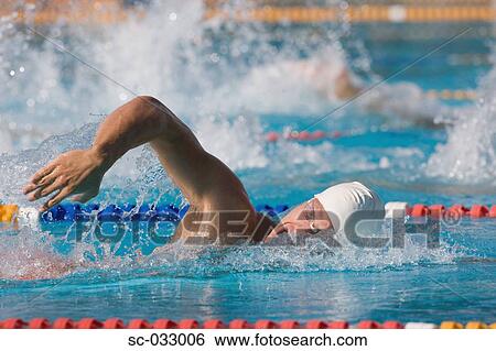 Stock Photograph - Young swimmer doing front crawl. Fotosearch