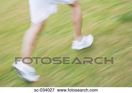 Stock Photo - Lower section of running person. Fotosearch