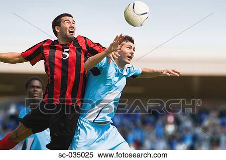 Stock Photography - Soccer players jumping for header. Fotosearch