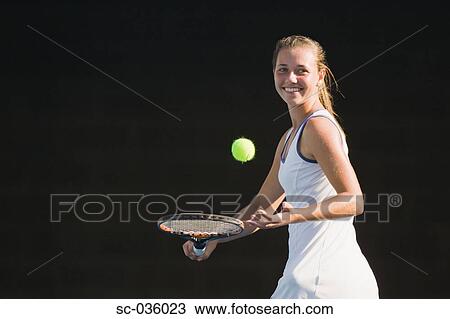 Female tennis player smiling View Large Photo Image Stock Image - Female tennis player smiling. Fotosearch