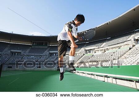 Tennis player celebrating victory View Large Photo Image Picture - Tennis player celebrating victory. Fotosearch