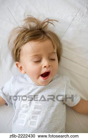 1 year old baby yawning. View Large Photo Image Stock Image - 1 year old baby yawning.. Fotosearch