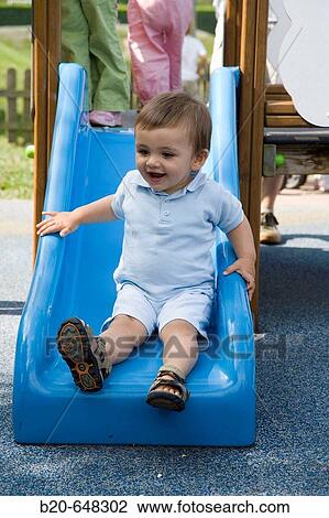 1 year old boy in playground View Large Photo Image Stock Image - 1 year old boy in playground. Fotosearch