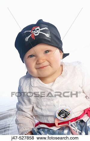 1 year old girl dressed up in a pirates costume, smiling into camera View Large Photo Image Stock Photo - 1 year old girl dressed up in a pirates costume, smiling into camera. Fotosearch