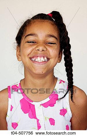 10-year-old biracial girl smiling View Large Photo Image Stock Photograph - 10-year-old biracial girl smiling. Fotosearch