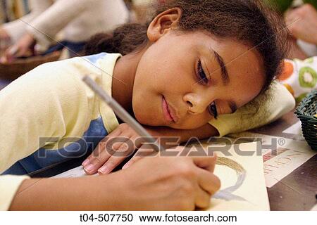 10-year-old biracial girl working on art project at the Cathedral of St. John the Divine, NYC. USA View Large Photo Image Stock Image - 10-year-old biracial girl working on art project at the Cathedral of St. John the Divine, NYC. USA. Fotosearch