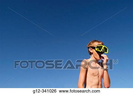 10 year old boy wearing goggles in swimming pool View Large Photo Image Stock Photograph - 10 year old boy wearing goggles in swimming pool. Fotosearch