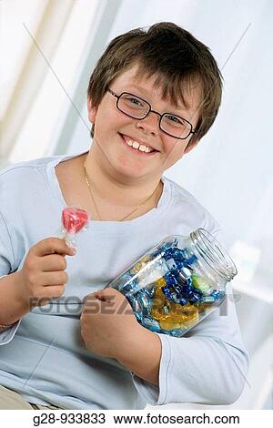 10 year old boy with candies, obesity View Large Photo Image Stock Image - 10 year old boy with candies, obesity. Fotosearch