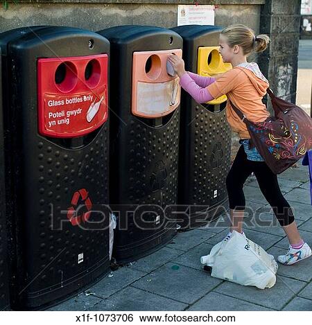 10 year old girl recycling bottles at a local authority operated mini bottle bank, Wales UK View Large Photo Image Stock Photograph - 10 year old girl recycling bottles at a local authority operated mini bottle bank, Wales UK. Fotosearch