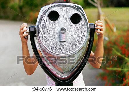 10-year-old girl with coin-operated binoculars View Large Photo Image Stock Image - 10-year-old girl with coin-operated binoculars. Fotosearch