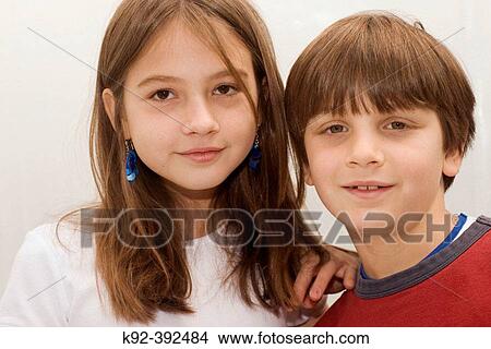 10 year old girl with her 7 year old brother. View Large Photo Image Picture - 10 year old girl with her 7 year old brother.. Fotosearch