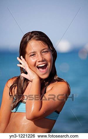 10 years old girl at the beach View Large Photo Image Stock Photograph - 10 years old girl at the beach. Fotosearch