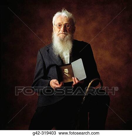 100 year old man holding portrait of self at 25 years old View Large Photo Image Stock Image - 100 year old man holding portrait of self at 25 years old. Fotosearch