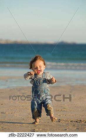 11 months baby learning to walk in Corrubedos beach, Galicia, Spain. View Large Photo Image Stock Photo - 11 months baby learning to walk in Corrubedos beach, Galicia, Spain.. Fotosearch