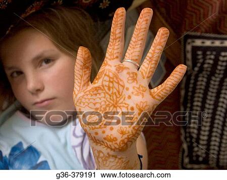 11 year old American girl shows off the Henna markings on her hand in Bangalore, India View Large Photo Image Stock Image - 11 year old American girl shows off the Henna markings on her hand in Bangalore, India. Fotosearch