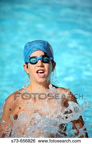 11 year old boy in swimming pool View Large Photo Image Stock Photograph - 11 year old boy in swimming pool. Fotosearch