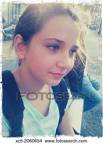 11 years old student wating for the bus, Barcelona, Spain View Large Photo Image Picture - 11 years old student wating for the bus, Barcelona, Spain. Fotosearch