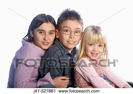 12 year old girl sitting with her 8 year old brother, and 3 year old sister, smiling into camera View Large Photo Image Stock Image - 12 year old girl sitting with her 8 year old brother, and 3 year old sister, smiling into camera. Fotosearch