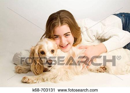 12 year old girl with spaniel in studio View Large Photo Image Stock Image - 12 year old girl with spaniel in studio. Fotosearch