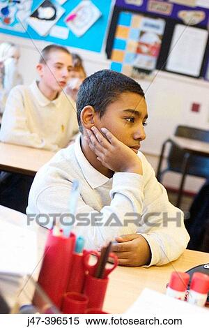 12 year old pakistani boy, sitting in class, concentrating on lesson View Large Photo Image Stock Photography - 12 year old pakistani boy, sitting in class, concentrating on lesson. Fotosearch