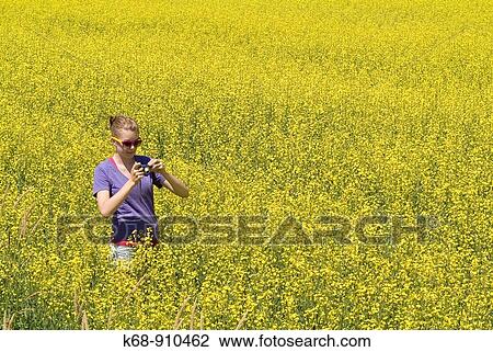 13 year old girl in canola field in British Columbia, Canada View Large Photo Image Stock Image - 13 year old girl in canola field in British Columbia, Canada. Fotosearch