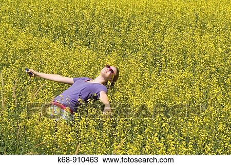 13 year old girl in canola field in British Columbia, Canada View Large Photo Image Stock Image - 13 year old girl in canola field in British Columbia, Canada. Fotosearch