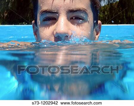 13 years old boy in swimming pool View Large Photo Image Stock Image - 13 years old boy in swimming pool. Fotosearch