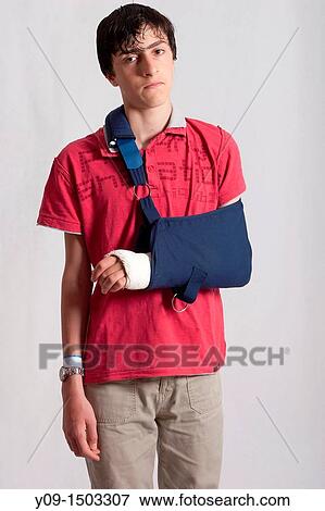 14 year old boy has arm splint View Large Photo Image Stock Photo - 14 year old boy has arm splint. Fotosearch