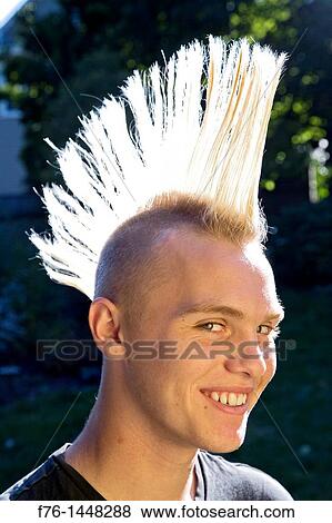 14 year old teenage boy with bleached hair and a spiked mohawk haircut, MR  071007-1 Stock Photo | f76-1448288 | Fotosearch