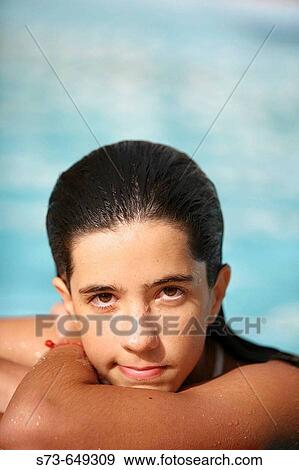 14 year old teengirl in swimming pool View Large Photo Image Stock Photo - 14 year old teengirl in swimming pool. Fotosearch