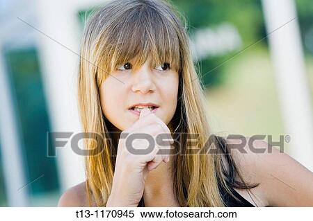 Stock Photography - 15 year old girl concerned. Fotosearch