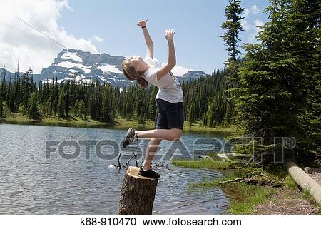 15 year old girl playing by Summit Lake, Waterton Lakes National Park, Alberta, Canada View Large Photo Image Stock Image - 15 year old girl playing by Summit Lake, Waterton Lakes National Park, Alberta, Canada. Fotosearch