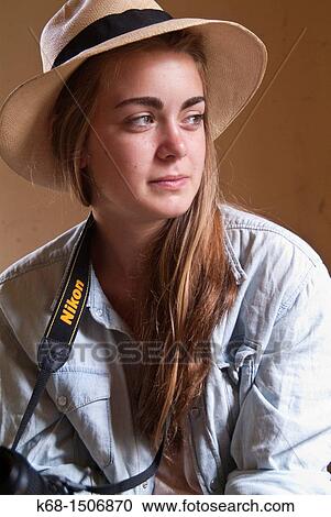 15 year old girl sits in an old abandoned house with her camera and wearing a Panama hat View Large Photo Image Stock Image - 15 year old girl sits in an old abandoned house with her camera and wearing a Panama hat. Fotosearch