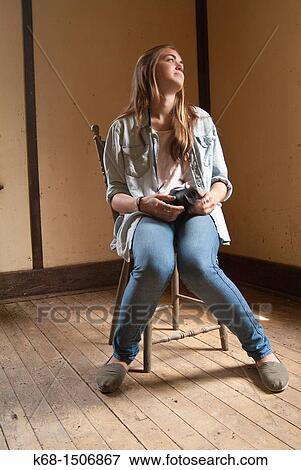 15 year old girl sits in an old abandoned house with her camera View Large Photo Image Stock Photo - 15 year old girl sits in an old abandoned house with her camera. Fotosearch