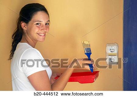 16 year old teengirl painting wall, home improvement View Large Photo Image Stock Image - 16 year old teengirl painting wall, home improvement. Fotosearch
