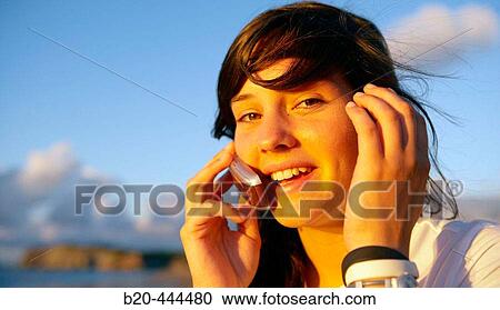 16 years old teenager talking on a mobile phone. Hendaye beach. Aquitaine. France. View Large Photo Image Stock Image - 16 years old teenager talking on a mobile phone. Hendaye beach. Aquitaine. France.. Fotosearch