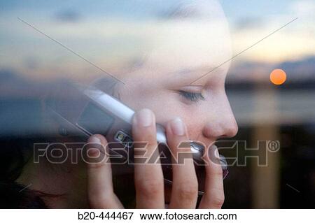 16 years old teenager with mobile phone in the evening. View Large Photo Image Stock Photo - 16 years old teenager with mobile phone in the evening.. Fotosearch