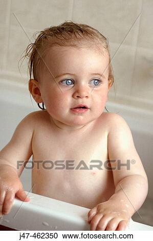 18 month old baby girl, in the bath, leaning on the side View Large Photo Image Stock Image - 18 month old baby girl, in the bath, leaning on the side. Fotosearch