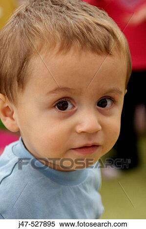 18 month old boy, gazing into camera View Large Photo Image Stock Photography - 18 month old boy, gazing into camera. Fotosearch