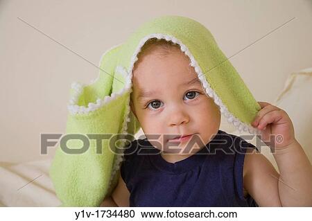18 month old boy on a bed View Large Photo Image Stock Image - 18 month old boy on a bed. Fotosearch