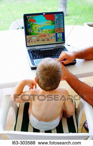 18 months old boy using laptop. View Large Photo Image Stock Photo - 18 months old boy using laptop.. Fotosearch