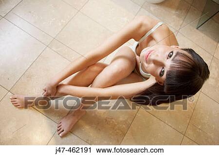 18 year old girl sitting on the floor in underwear smiling into camera View Large Photo Image Stock Image - 18 year old girl sitting on the floor in underwear smiling into camera. Fotosearch