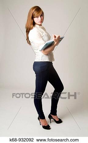 18 year old girl with book in studio portrait View Large Photo Image Stock Image - 18 year old girl with book in studio portrait. Fotosearch