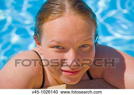 18 years old girl in outdoor swimming pool. View Large Photo Image Stock Image - 18 years old girl in outdoor swimming pool.. Fotosearch
