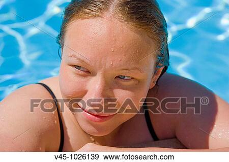 18 years old girl in outdoor swimming pool. View Large Photo Image Stock Photo - 18 years old girl in outdoor swimming pool.. Fotosearch