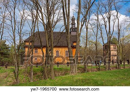 Stock Image - 18th-century timber church with a belfry from Drazdzewo village in Museum of the Mazovian Countryside in Sierpc, Poland.. Fotosearch