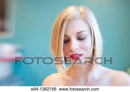 19 year old blond woman looking down. View Large Photo Image Stock Photograph - 19 year old blond woman looking down.. Fotosearch