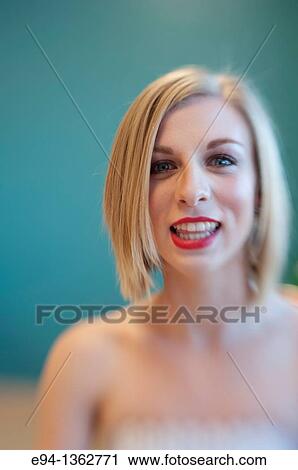 Stock Image - 19 year old blond woman making a funny face. Fotosearch